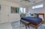 Bright and open bedroom with patio access